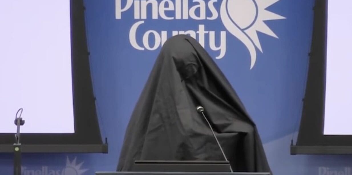 Burqa-Clad Woman Blasts Islamic Call to Prayer During Florida County Commission Hearing (Video)